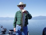 My uncle Floyd Lay with the biggest rainbow of our trip to Klamath Lake. The fish weighed 5 LB.